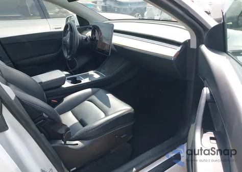 2022 Tesla Model Y из США, поврежденный, VIN 7SAYGDEE1NF386630